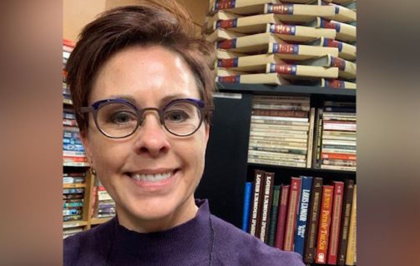 smiling used bookstore owner