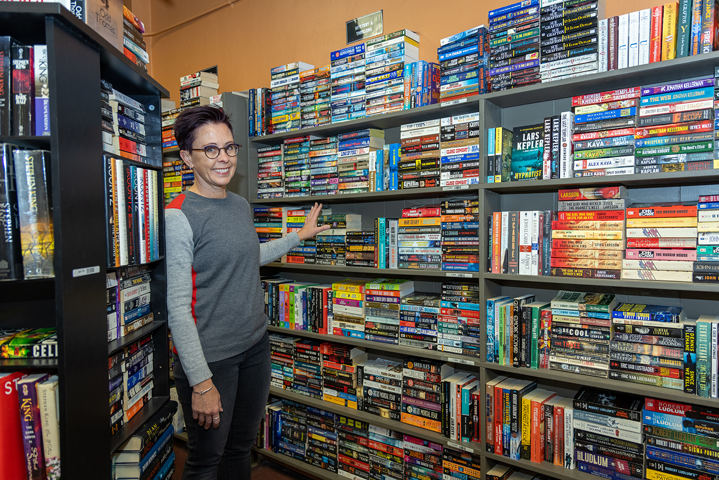 owner displaying beautiful bookcase